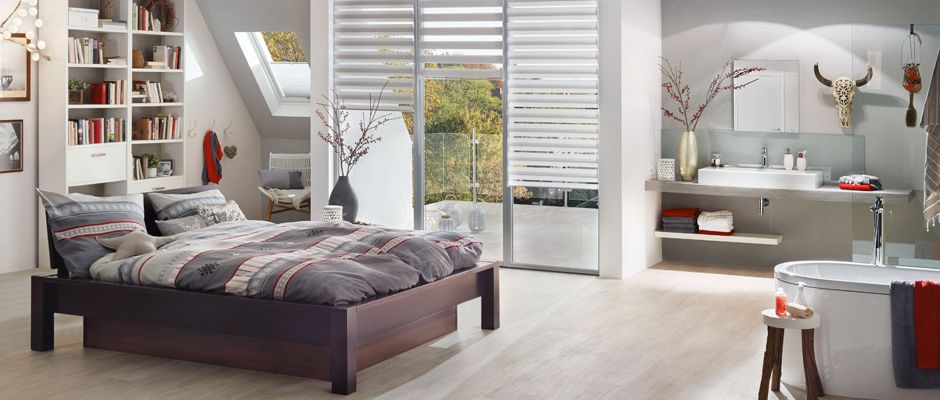 Badtrends-bad-en-suite Alles in einem: Beim Wohntrend „Bad en suite“ gehen der Schlafbereich und das Badezimmer fließend ineinander über. Foto: djd/Knauf Bauprodukte